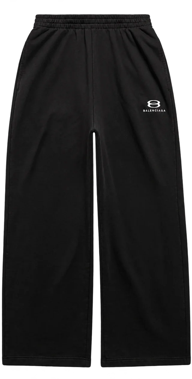 Balenciaga Unity Sports Icon black baggy sweatpants with small white embroidered logo, front view; reference photograph