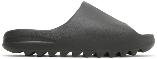adidas x Yeezy Yeezy Slide — Onyx, complete shoe, lateral side view; reference photograph